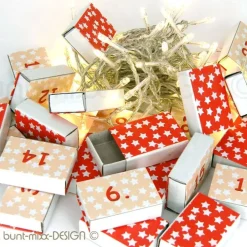 Adventskalender zum Befüllen Sterne Sternchen rot weiß Kraftpapier Mini-Schachteln 24x Schiebeschachtel Adventskalender
