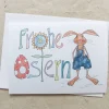 bunte Karte, FROHE OSTERN und Hase in Latzhose, Klappkarte DinA 6, mit Umschlag. Osterkarten