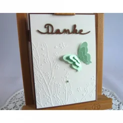 New Dankekarte mit Hintergrundprägung und Schmetterling Dankeskarten