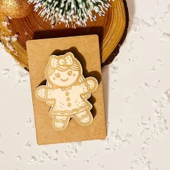 Deko-Figur Lebkuchenfrau, Holz auf Kraftpapier Geschenkeanhänger