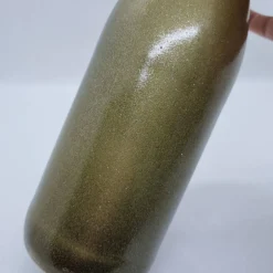 Hot Dekorative Flasche in Kupfer mit Glitzereffekt. Perfekte Tischdekoration für die nächste Feier. Tischdekoration