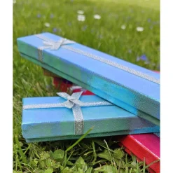 Sale Geschenkverpackung, changierend, in Hellblau und Pink Geschenkverpackungen