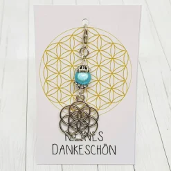 Outlet Glücksbringer Same des Lebens Anhänger silberfarben mit hellblauer 3D-Acrylperle & Karabiner Geschenke