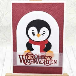 Weihnachtskarten|Kleine Schätze Handgemachte Weihnachtskarte A6 mit Pinguin und rotem Schal – liebevoller Wintergruß in Rot-Weiß“