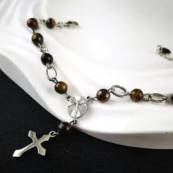 Rosenkranz-Armband aus Edelstahl mit Tigeraugeperlen – Spiritualität & Stil vereint Rosenkränze
